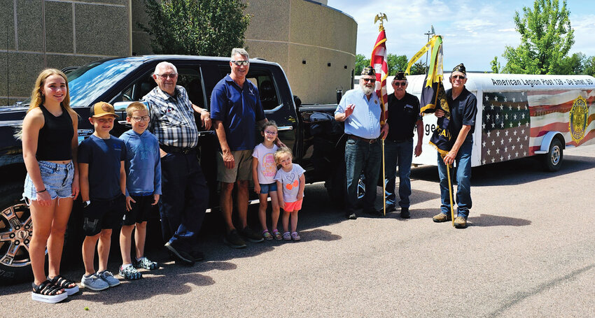 The participants of this year's Old Settlers Day Legion float were Megan Albrecht, left, Tyler Albrecht, Sage Smith, Henry Albrecht, Mike Albrecht, Joey Smith, Andie Smith as well as three Legion members who carried flags to kick off the parade. All the children pictured are great-grandchildren of Henry Albrecht.