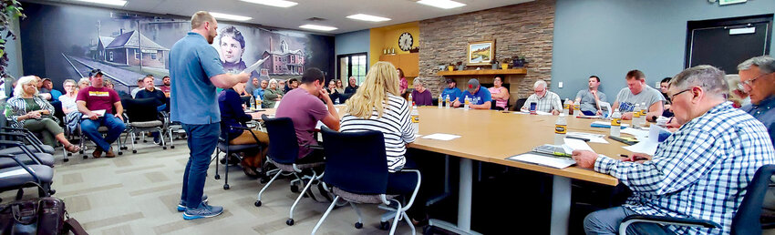 Jamie Lancaster, De Smet Development Corporation Director, had a large audience in the meeting room at the Event Center during the special city council meeting on Monday night as numerous community members and others attended the meeting, interested in hearing about the upcoming Main Street project.