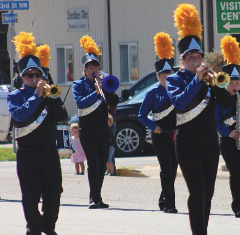 The Lake Preston marching band follows the flags to begin the Homecoming parade in Lake Preston.