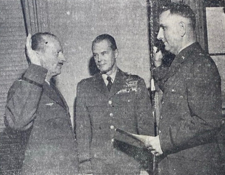 SEVENTY-FIVE YEARS AGO: Washington &ndash; Maj. Gen. Harry G. Armstrong (left) is the new Surgeon General of the U.S. Air Force Medical Services. Administering the oath is Maj. Gen. Reginald C. Harmon, Air Force Judge Advocate General. Among the officials and friends who witnessed the ceremony was Gen. Hoyt S. Vandenburg (center), Chief of Staff of the Air Force.