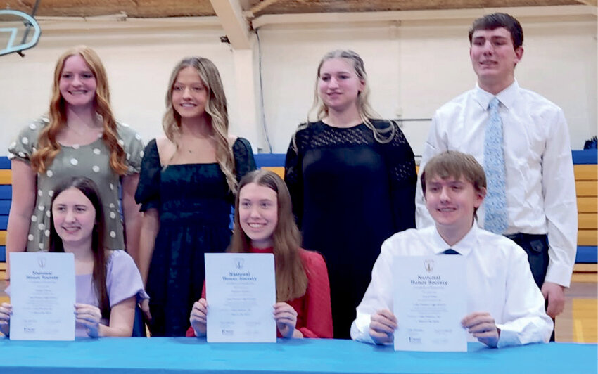 Lake Preston recently inducted new members, sophomore Josslyn Emery, left, and juniors Mallory Carlson and Lorick Pirlet, to the National Honor Society. Current members Hadlee Holt, back left, Trinity Pirlet, Brityn Davies and Ben Curd helped with the induction ceremony.