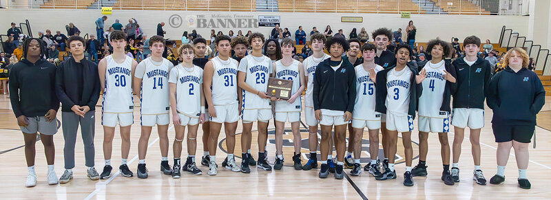 The District 12-AA Boys Basketball champion Huntingdon Mustangs.