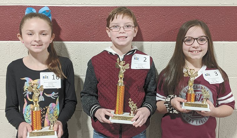 Top spellers in third grade were, from left, Brooklyn Black, second place; Lucas Pratt, first place; and Callie Bryant, third place.