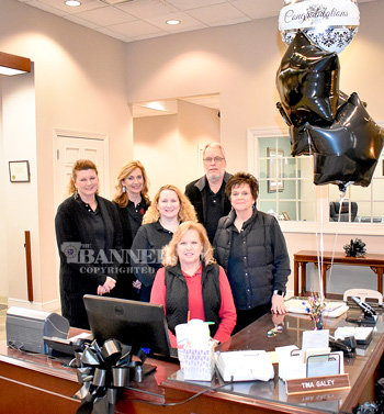 Seated is Tina Galey on her last day at the Bank of Gleason; standing are co-workers (L to R): LeAnn Sellers, Jackie Taylor, Sandra Walker, James Terrell and Charlene Snider.