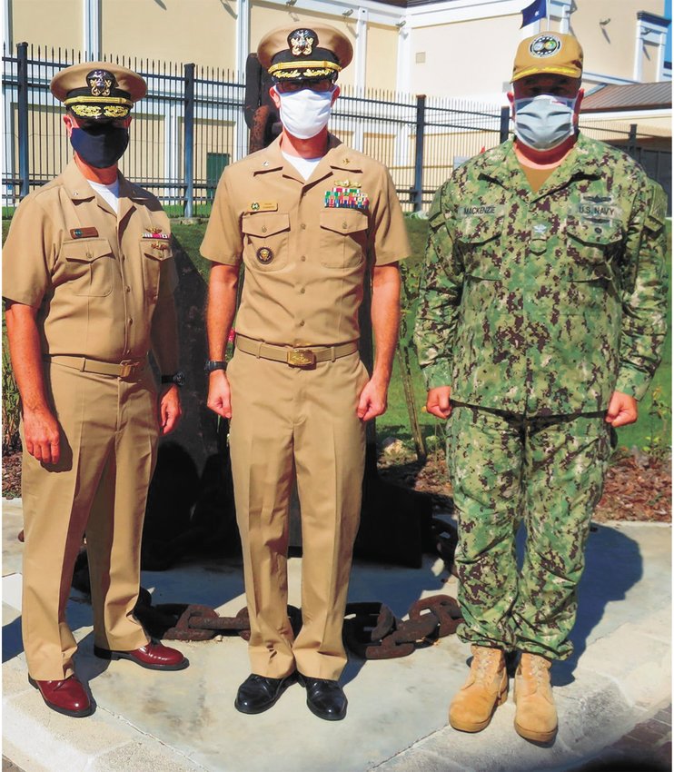 (L to R) RDML Mike Curran (provided the oath), CDR Brent Summers, and CAPT Doug MacKenzie (pinned on new rank).
