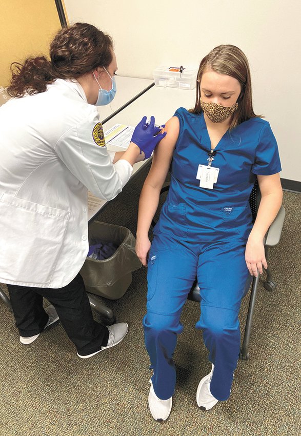 Savannah Pratt, student pharmacist, is pictured receiving the Moderna vaccine on Wednesday, December 23 at Henry County Medical Center.