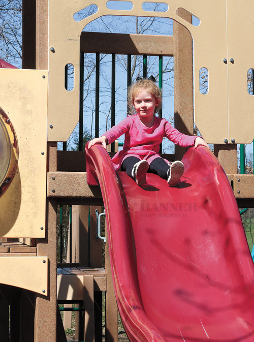 Piper Russell of McKenzie, age 3, enjoys the beginning of spring by playing on the playground at McKenzie Park. Piper is the daughter of Dr. Travis Russell and Dr. Bethany Russell.