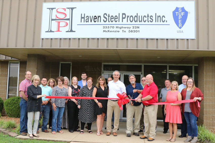 Haven Steel President Ken Brown and his wife, Alison, Bob Dennison, Tom O&rsquo;Brien, members of the Carroll County Chamber of Commerce and members of the McKenzie Chamber of Commerce attended Haven Steel&rsquo;s ribbon cutting ceremony. Bob Dennison, general plant manager of McKenzie&rsquo;s Haven Steel plant, cut the ribbon.