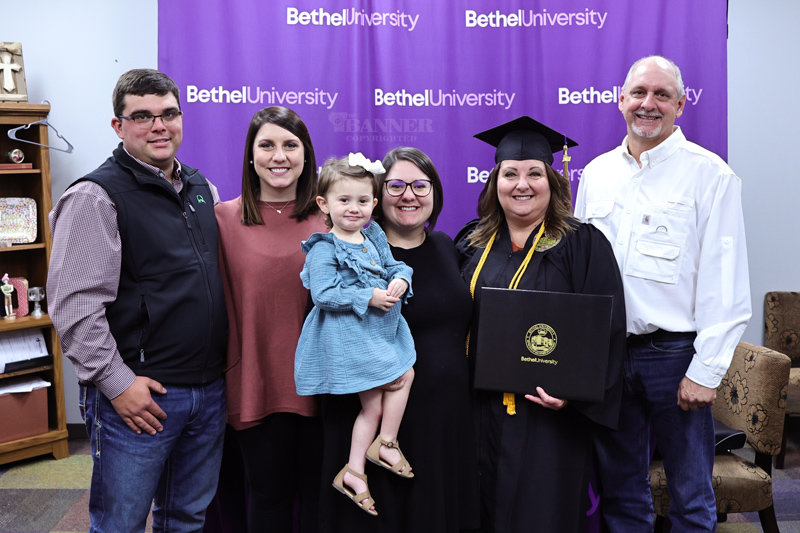 Terri Delaney celebrates her graduation with family members &mdash; Sam and Ashley Savage, Morgan Foster, Nora Foster, and husband, Randy Delaney.