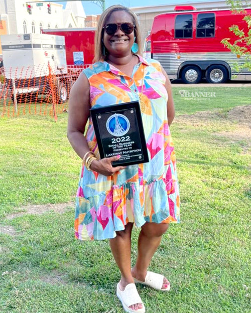 Owner LaShonda Williams accepted the Small Business of the Year award during the Tennessee River Jam festivities.