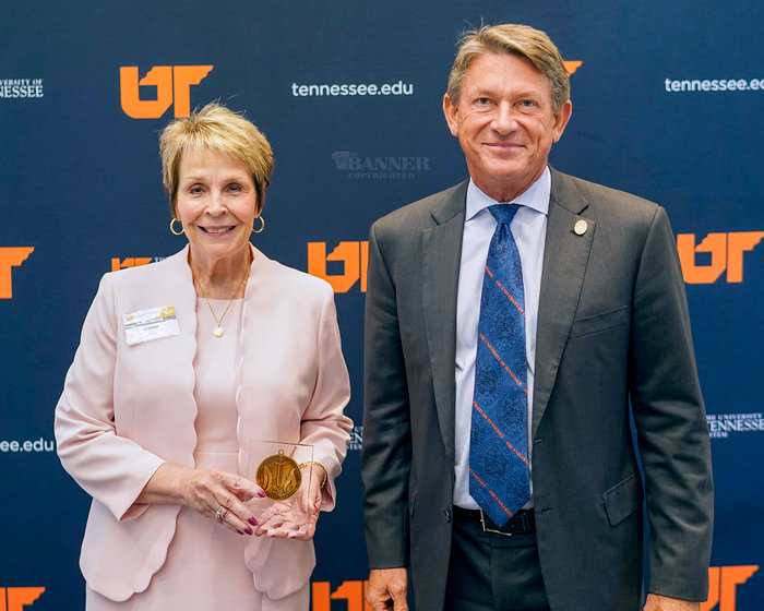 Cindy West, dean of the UT Martin College of Education, Health and Behavioral Sciences, received the &ldquo;Embrace Diversity&rdquo; President&rsquo;s Award at the UT Board of Trustees annual meeting July 24 in Knoxville. West is pictured with University of Tennessee System President Randy Boyd.