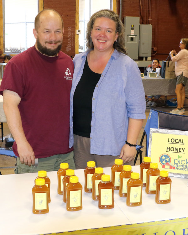 Oliver and Lisa Costello of Hollow Rock sold locally-sourced honey from their own beehives.