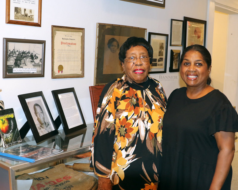 Rubye Norman and daughter, Gina Atkins at the African-American display. Rubye is in pictured in a 1952 photograph of Hale School, which was located on the site of the Huntingdon Primary School.