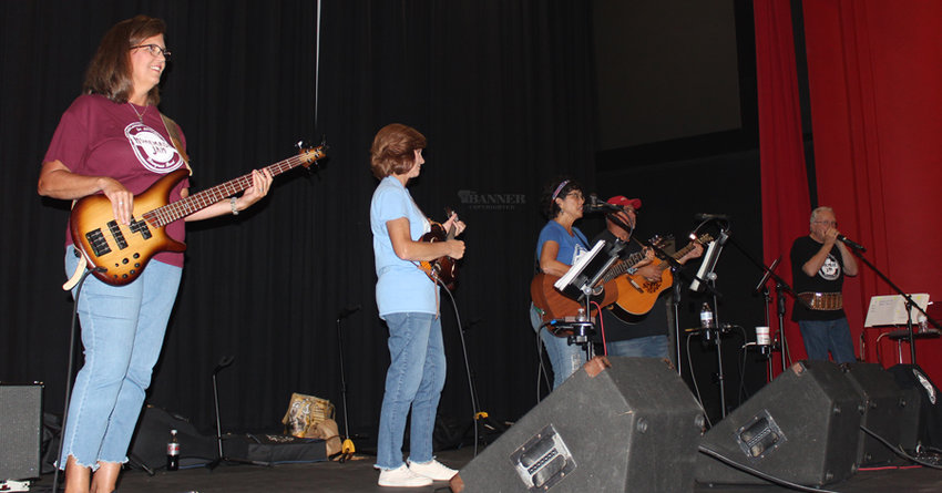 The Homemade Jam Bluegrass Band performed at Nights on Broadway July 21. The event, typically at Banner Row, relocated to McKenzie&rsquo;s Park Theatre due to an excessive heat wave.