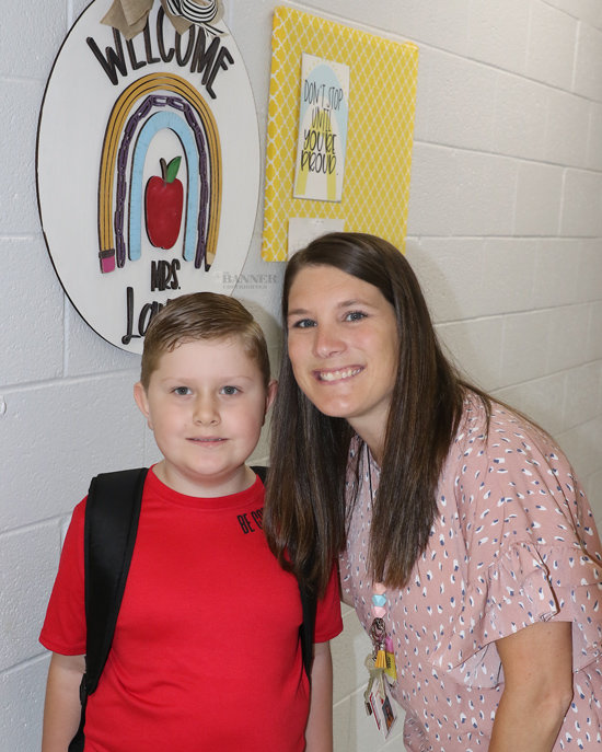 Colby Dial with teacher Lauren Flanagan for the first day in first grade at McKenzie.