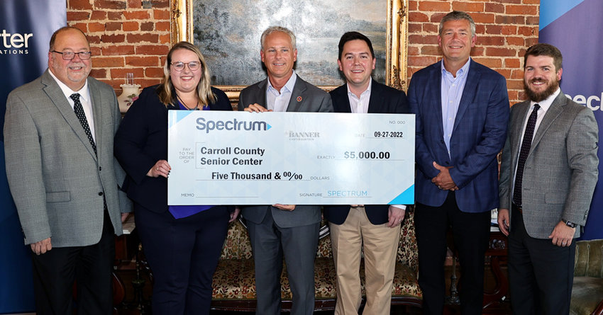 A $5,000 check for the Carroll County Office on Aging. Pictured are Brad Hurley, Taylor Batey, John Stevens, Zack Bates, Tandy Darby, and Joseph Butler.