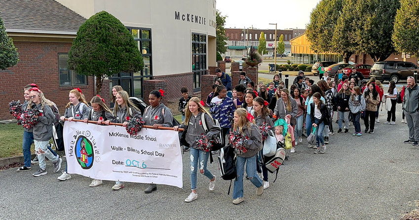 McKenzie Middle School students walk from McKenzie City Hall on Walk to School Day.