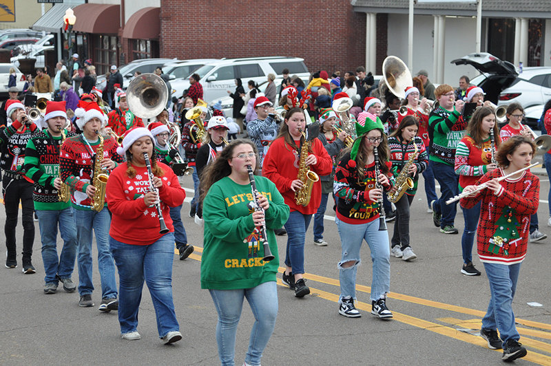 Huntingdon High School Band students march and play a holiday selection.
