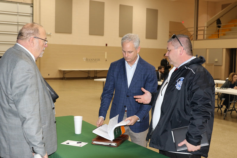 State Senator John Stevens was the featured speaker at Capitol Talk on Friday, February 10. Stevens (center) speaks with Brad Hurley, president of the Carroll County Chamber of Commerce and Dr. Myles Hebrand, director of schools Hollow Rock-Bruceton Central School District.