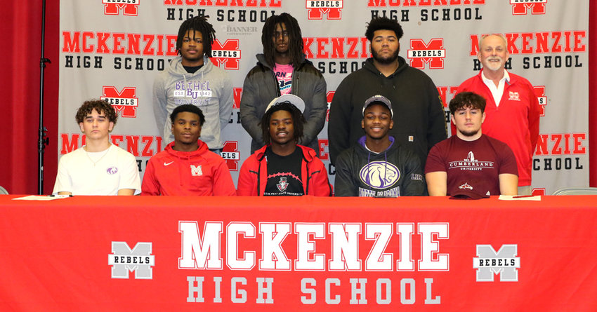 Front Row (L to R): Zach Aird, North Alabama; Etijay Tharpe, Bethel University; Marquez Taylor, Austin Peay State University; Camden Allison, North Alabama; and Hunter Harvey, Cumberland. Back Row (L to R): Zay Webber, Bethel; Rashad McCreary, Bethel; and Jose Luna, Bethel. Also pictured is Wade Comer, head coach of the McKenzie Rebels.
