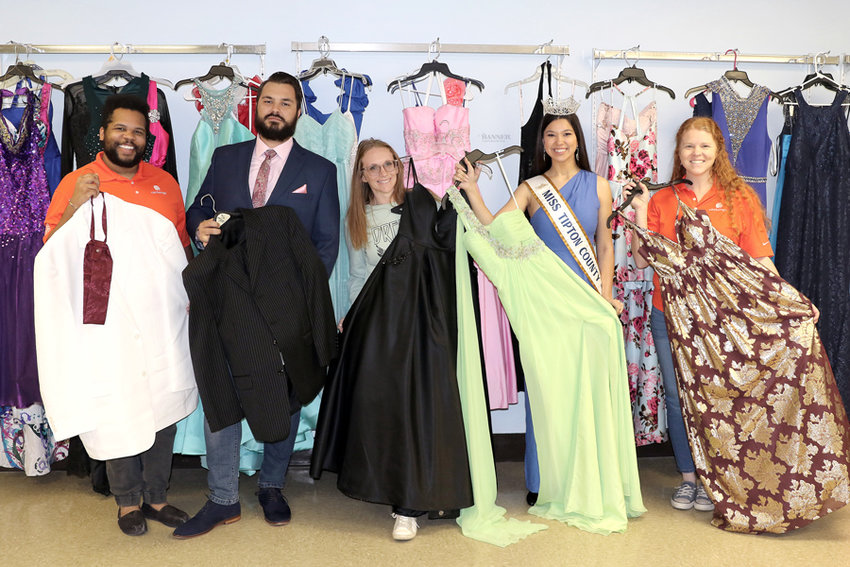 Free Prom Attire (L to R): Josh Shaw, William Beaulieu, Cheyenne Moore, Gracelyn Eaves and Andrea McReynolds display free prom attire for the one-day free event.