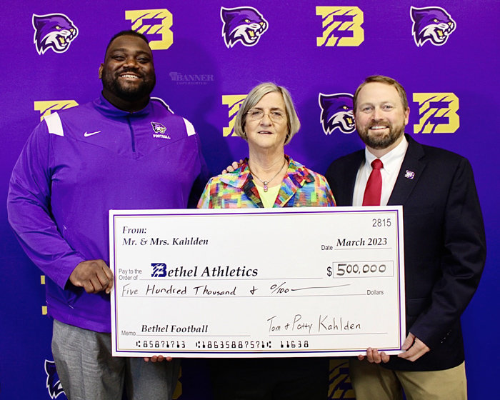 Bethel Football Coach Michael Jasper, Patty Kahlden, and Brad Chappell, director of the Athletic Department at Bethel. Mrs. Kahlden presented $500,000 to the football program.