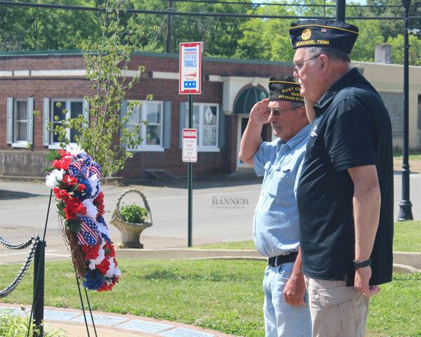 Dana Deem, American Legion Post 37 member and retired master sergeant of the U.S. Air Force, and Steve Davis, VFW Post 4939 Commander and retired sergeant major of the U.S. Army, saluted the Memorial Wreath.