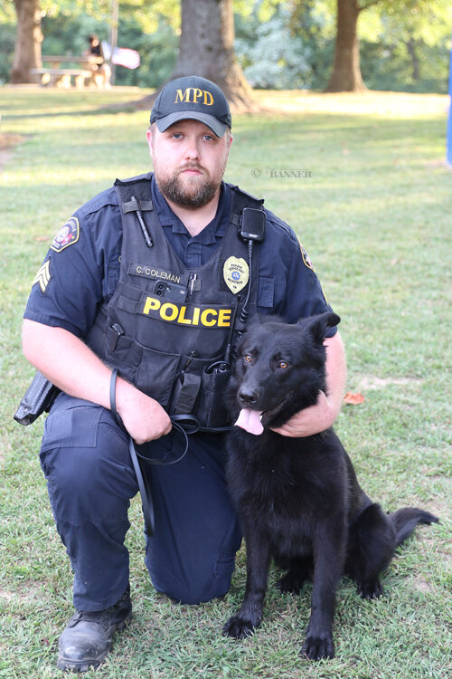 Sergeant Coleman and his new canine officer, Toby.