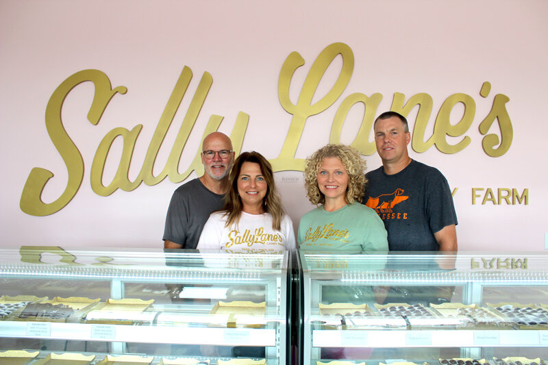 Philip and Lisa Todd (left) and Lori and Clay Nolen (right) bought Sally Lane&rsquo;s Candy Farm in late January and relocated the store to 1060 Mineral Wells in April.