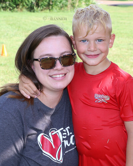 Sierra Vandiver of Dresden with her six-year-old son, Johnathan St. Clair, who is diagnosed with Lipofibromatosis and is being treated at St. Jude Children&rsquo;s Research Hospital. A soaked Johnathan had just participated in a watergun fight on the lawn of the VFW in McKenzie.