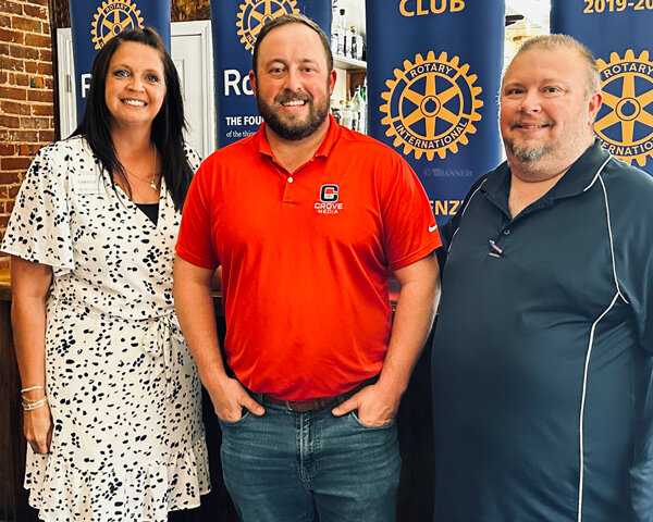 Pictured (L to R) are McKenzie Rotary Vice-President Christy Williams, Hutson and McKenzie President Jason R. Martin.