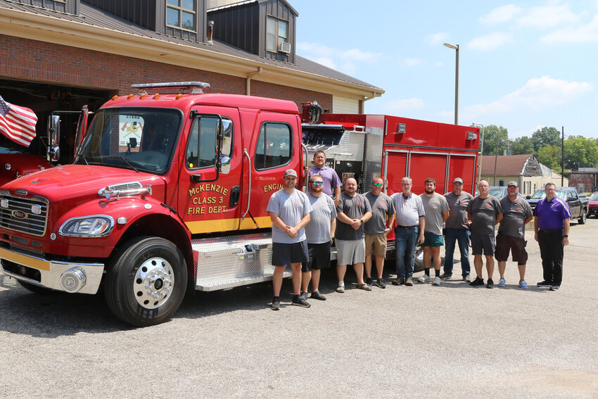 The 2023 Pierce pumper arrived at the McKenzie Fire Station on August 24. Pictured is MFD firefighters Jonathan Castleman, Jason Arnold &mdash; Battalion Chief; Daniel Hollowell &mdash; Assistant Chief; Jonathan Gaskins &mdash; EMS Operations Chief; Chief Brian Tucker, Dr. John Nelson, Jake McDaniel, Lt. Robert Williams, Lt. Robert Ross, Roger Christian &mdash; Assistant Chief and Mayor Ryan Griffin.
