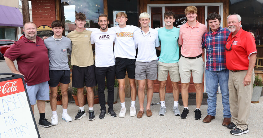 McKenzie Rotary President Jason R. Martin (left) and Coach Wade Comer (right) join the senior members of the McKenzie High School Football Team. Players (L to R): Brady Brewer, Dalton Hatley, Stafford Roditis, Lute McCaslin, Jake Cassidy, Ace Fisher, Drew Chappell and Cameron Flippin.