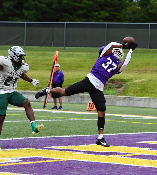 #37 J.D. Dixon leaping for a TD reception.