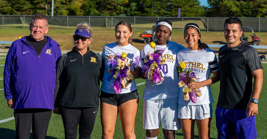 The senior members of the Bethel Women&rsquo;s Soccer were recognized in Friday&rsquo;s game. Pictured (L to R): Consultant Armand Hebert, Head Coach Misty Aird, Elizabeth Kriebel, Natasha Dudley, Nathalie Rojas and Assistant Coach Armando Castro.