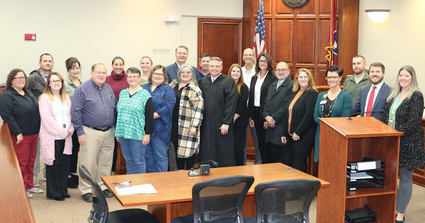 Seven new Court Appointed Special Advocates (CASA) volunteers were administered the oath of office by Carroll County Judge Michael King on Thursday, November 2. They are supported by other CASA board members, court officials, and state and local government officials.