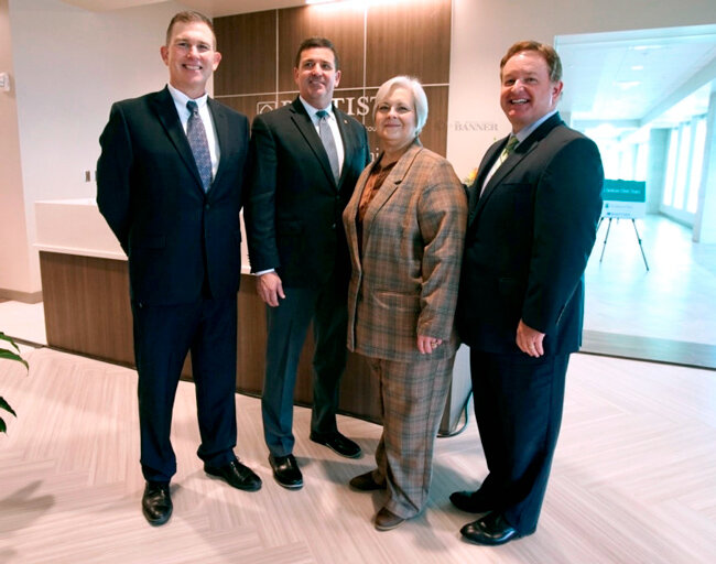 Dr. William Preston, president with The Jackson Clinic board of directors, and Mark Allen, CEO of The Jackson Clinic, Susan Breeden, administrator of Baptist Hospital-Huntingdon, and Jason Little, President and CEO of Baptist Memorial Health Care.
