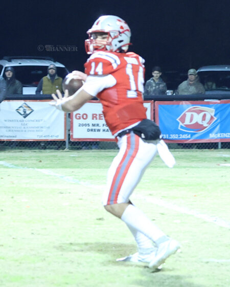 McKenzie&rsquo;s Tate Surber looks for an open receiver down field.