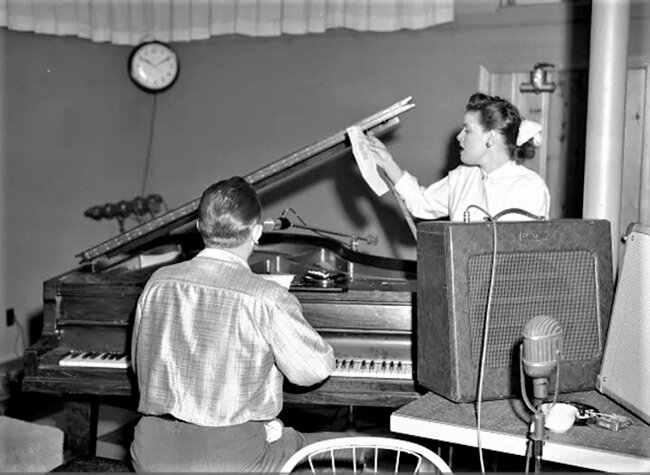 Patsy Cline and Owen Bradley work up an arrangement, 1957