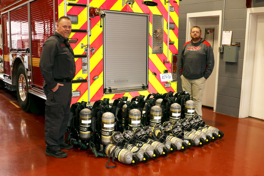 Pictured are McKenzie Fire Chief Brian Tucker (left) and Battalion Chief Jason Arnold with the new equipment.