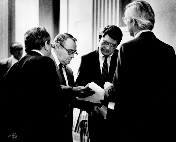 Bingo lobbyist W.D. &ldquo;Donnie&rdquo; Walker, second from left, discusses proposed amendments to bingo reform legislation with the bill&rsquo;s sponsor, Sen. Frank Lashlee, second from right, D-Camden, outside the Senate chambers March 28, 1988 as other bingo lobbyists David &ldquo;Peabody&rdquo; Ledford and Bill Bruce look on.