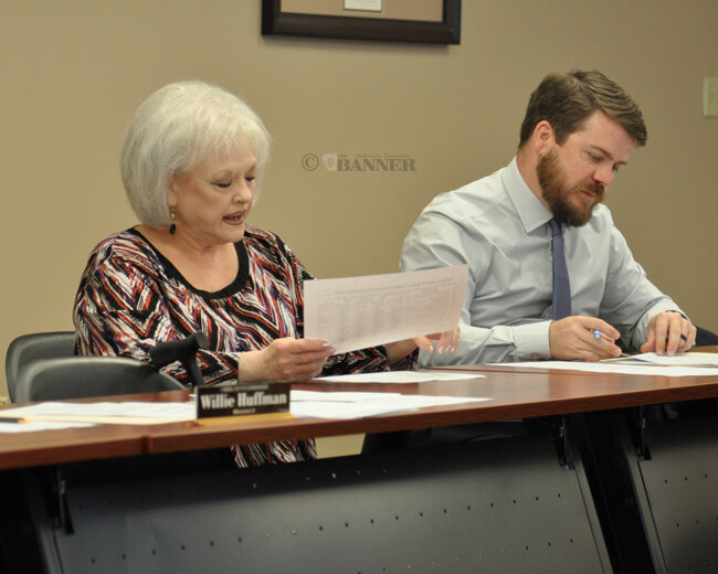 Property Assessor Rita Jones (left) presents her proposed budget as County Mayor Joseph Butler (right) listens.