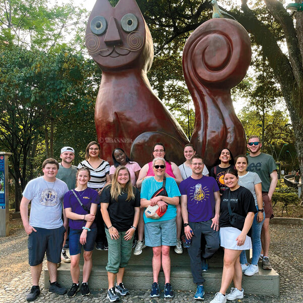 After time in the classroom interacting with students of all ages as native English speakers, volunteers from Bethel University and Global Citizen Adventure Corps toured areas of Cali, Colombia. They are seen here in Parque del Gato (Park of the Cat). Back Row (L to R): Jacob Ervin, Brandi George, a teacher from Colegio Americano, Charli Rice, Jessica Burns, two more teachers and Carson Stover. Front Row (L to R): Trevor Scott, Koryn Fenty, Sydney Moyer, Christa Rice, Garrett Burns and Mercedes Wright.