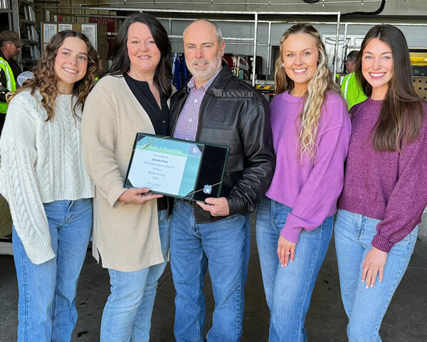 Jeremy Pate was honored for 25 Years of Safe Driving by UPS on March 28. He is joined by his family, Lydia, Gina, Emma and Sydney.