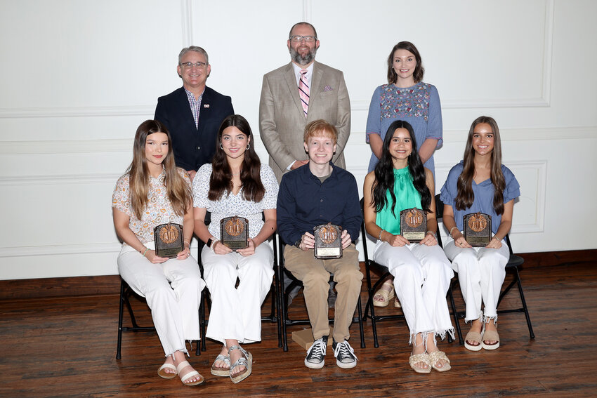ACT Honorees — (L to R) Front Row: Olivia Arnold, Bella Arnold, Ava Mae Warman, Skyelor DeLoach, Abby Quinn and Allison Mansfield. Back Row: Mandy Bryant — a Chamber Board Member, Will Woods, Casey Walker, Chandler Conrad, and Brad Hurley, president of the Carroll County Chamber of Commerce. Absent were Ava Flippin and Paridhi Patel.