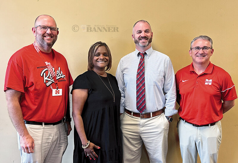 Pictured are Dr. Justin Barden, director of schools; LaShonda Williams, a Rotary member and chairman of the school board; Coach Keith Hodge; and Kelly Spivey, principal at McKenzie High School.