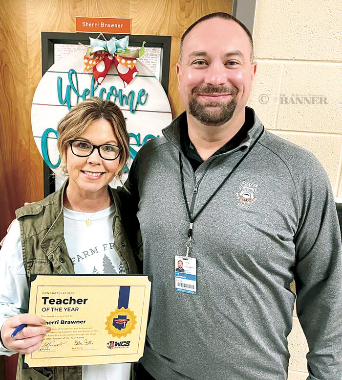 Sherri Brawner with Lee Lawrence, School Principal when she earned Teacher of the Year for Weakley County in December 2023. She is now a finalist for Teacher of the Year for the West Tennessee division of Tennessee.