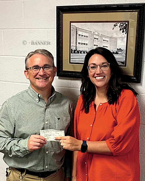 Principal Kelly Spivey (MHS Class of 1989) and MHSAA Treasurer Lauren Hickman (MHS Class of 2007), who presented a donation on April 24, 2024.