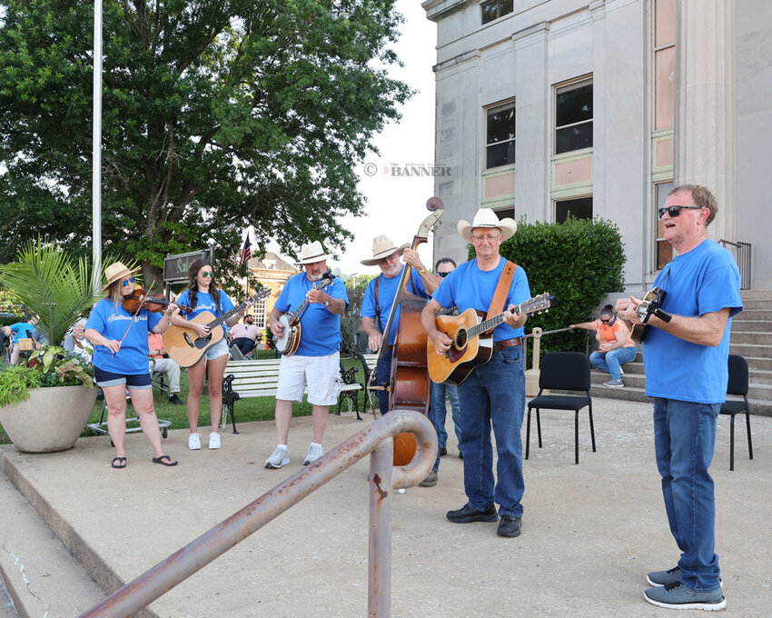 Scattered Grass provide bluegrass music through an acoustic set on Saturday evening during the full moon.