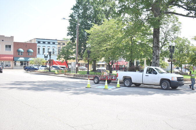The parking spaces on the east side of Broadway were re-striped to complete the process of transitioning the downtown street from one-way back to its original two-way layout.